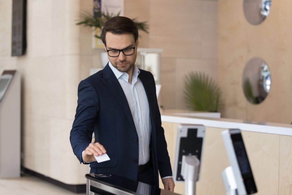 Business Owner Scanning His Keycard For Entry To His Office