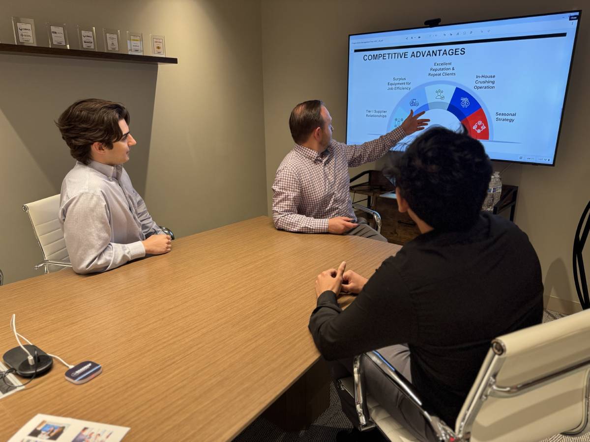 M&A Advisors Discussing Sell Side Business Growth in Meeting