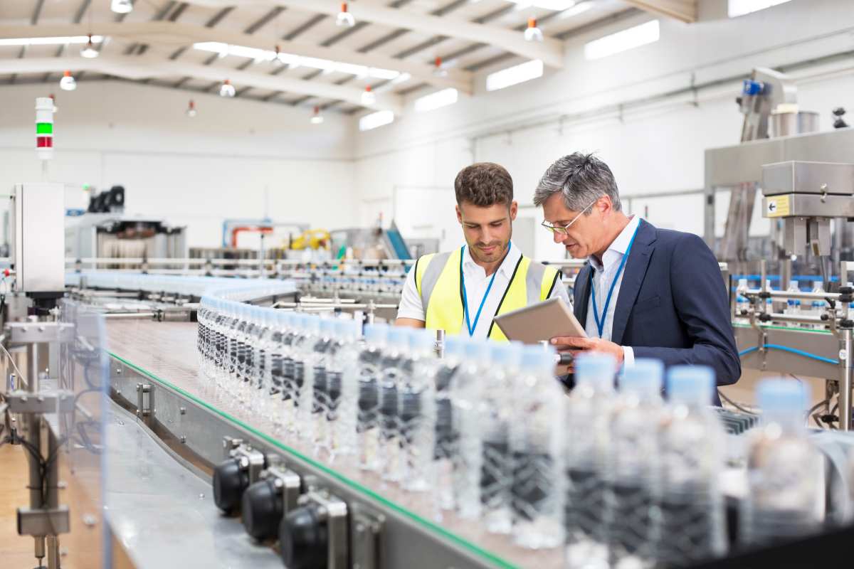 Two Men Working At A Food and Beverage Manufacturing Plant