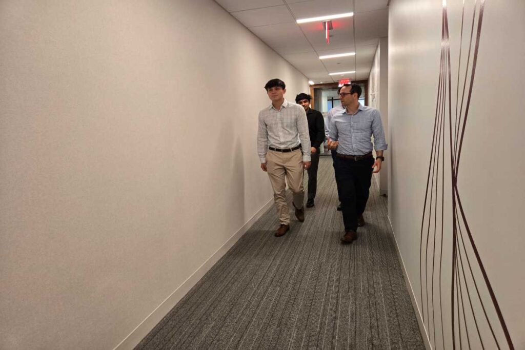 M&A Advisors Coming Out from a Meeting