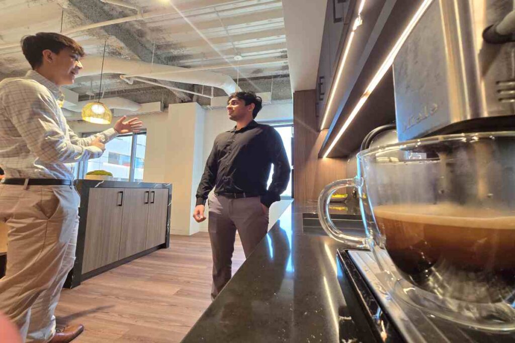 M&A Advisors Talking to Each Other During Coffee Break