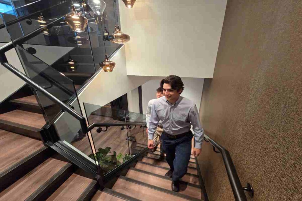 M&A Advisors Walking Through Stairs