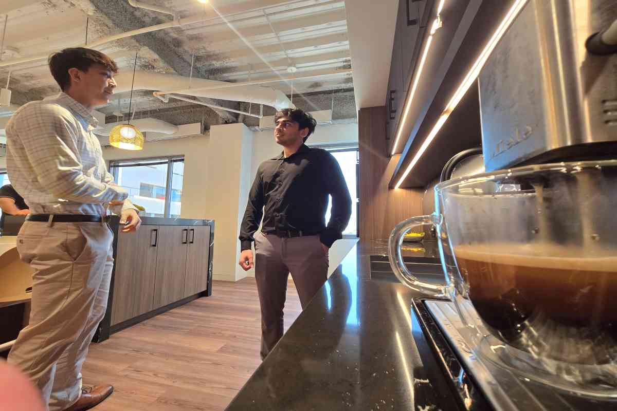 Two M&A Advisors Near Coffee Machine