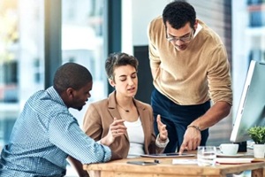 office and business people on tablet in discussion for planning, teamwork and project ideas