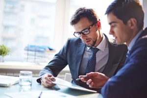 ceo listening to colleague