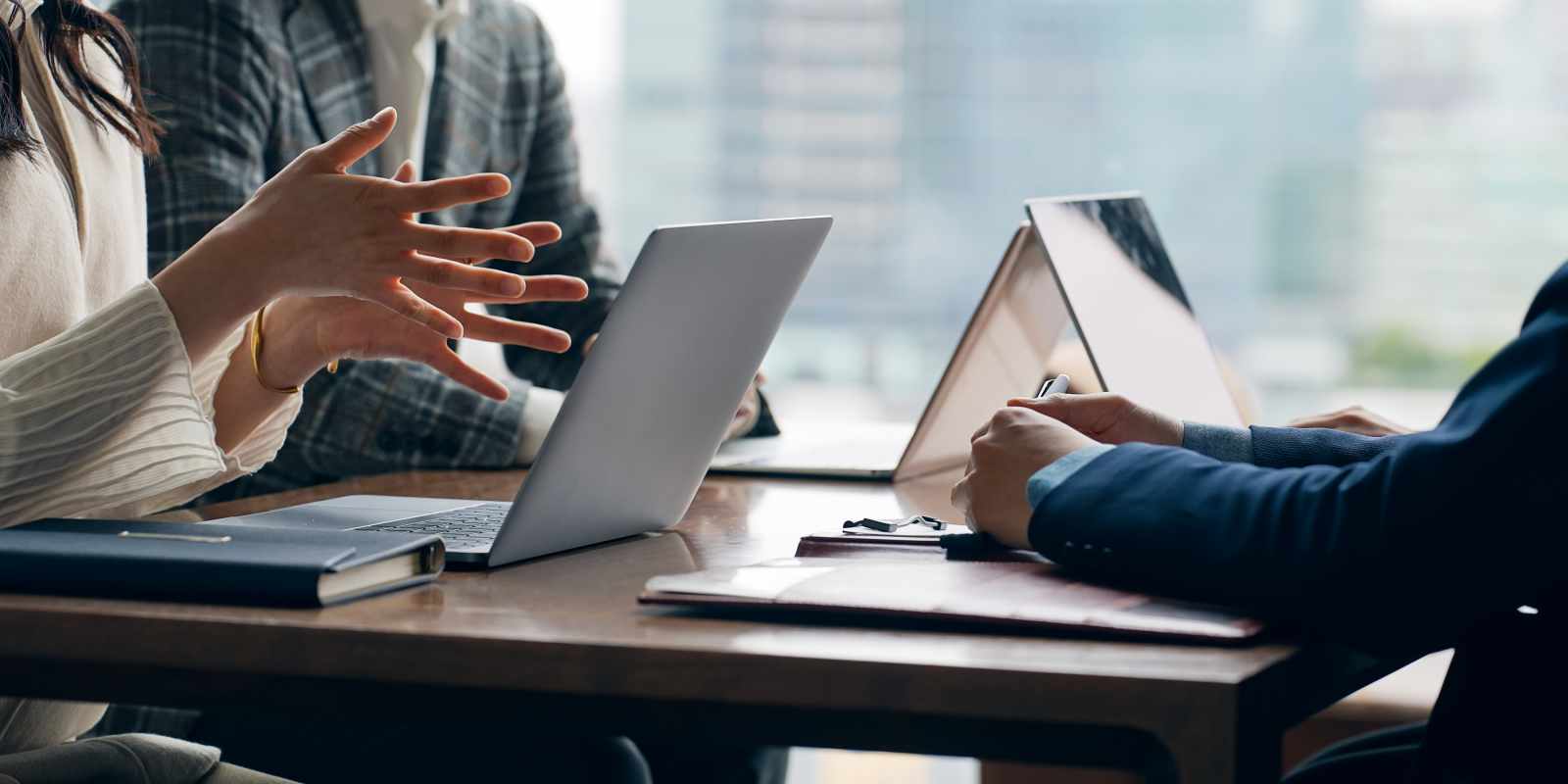 Business People Discussing Selling Strategies in Office