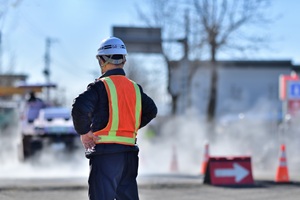 man during paving work