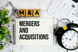 Mergers and Acquisitions Text with Calculator and Alarm Clock