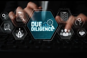 keyboard with technology icons highlighting due diligence process, analysis, finance, research, assessment