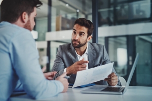 Businessman Consulting with an Advisor for Valuation Strategy