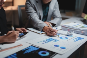 M & A Advisor Analyzing Business Transaction Data Reports