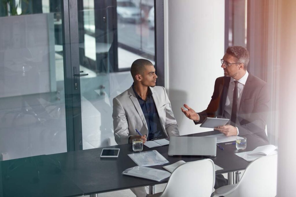 M & A Advisor Explaining Sell-Side Diligence Strategy to Buisness Owner
