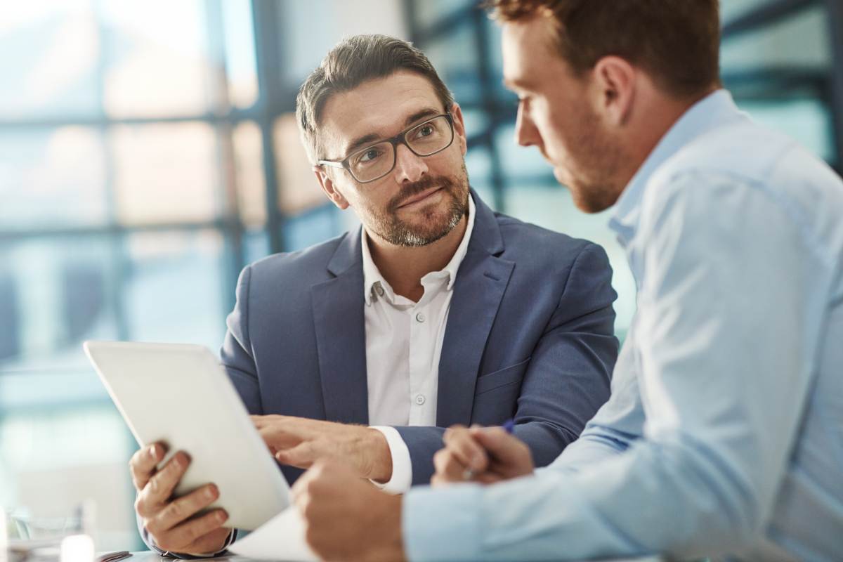 M & A Advisor Showing Market Testing Strategy to Business Owner