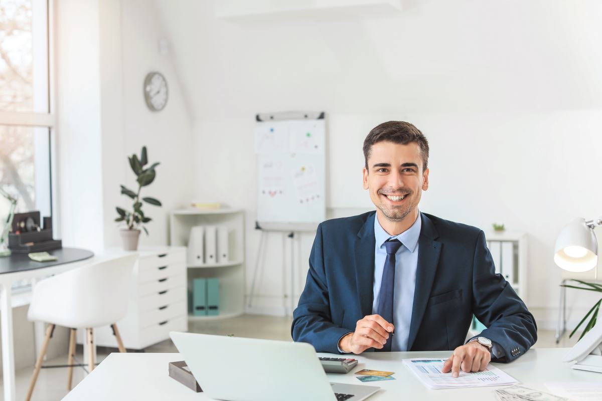 M &A Advisor Working on Value Creation Strategy in His Office