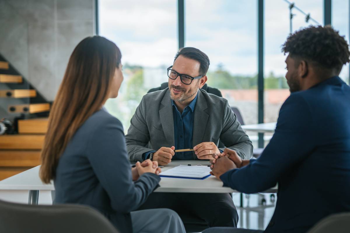 Professional M & A Advisor Discussing Value Creation Strategy to Business Owners