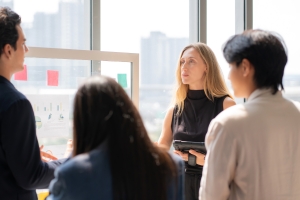Business People Analyzing Financial Reports for Selling Strategy