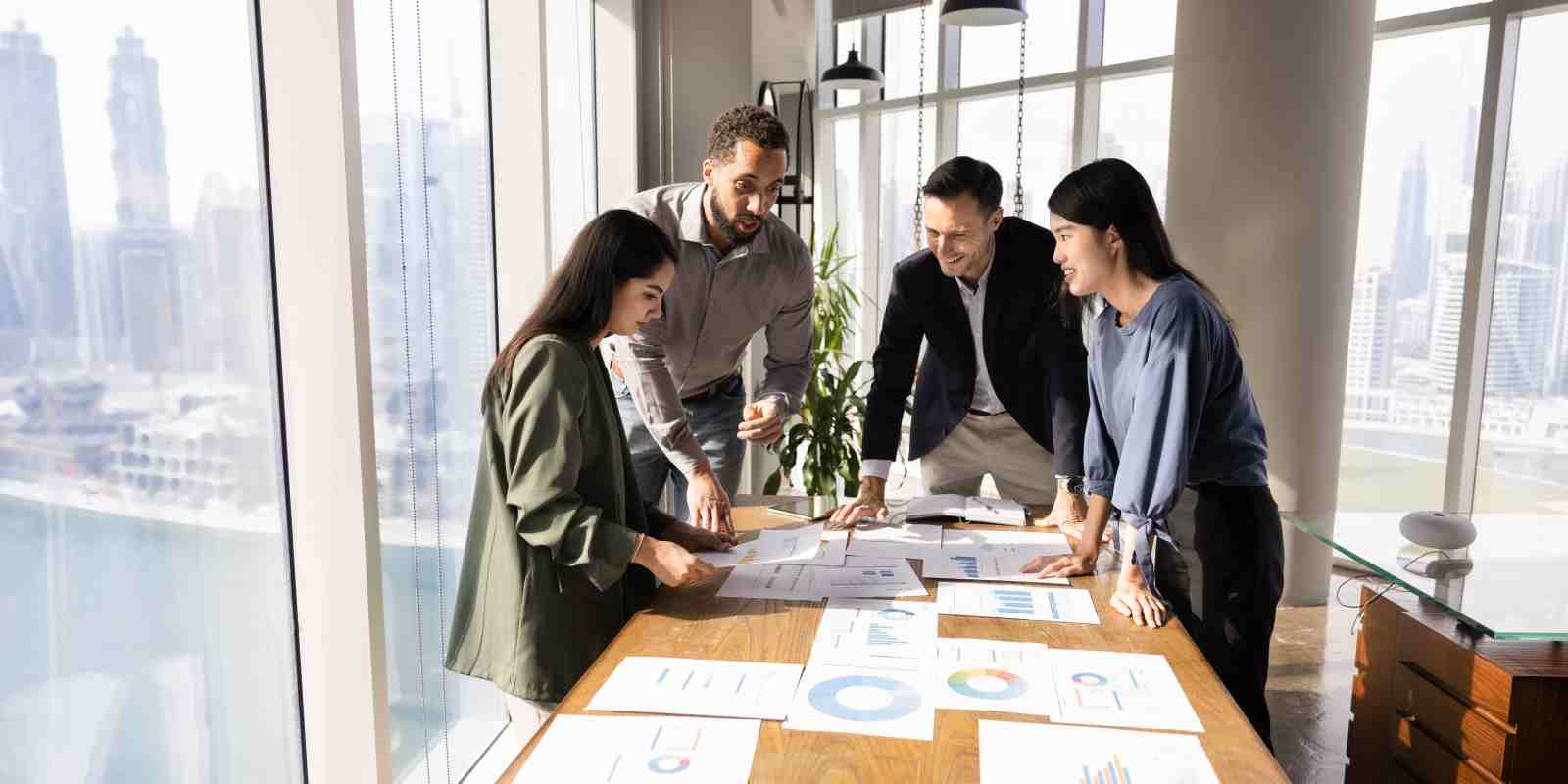 Business Team Working on Selling Strategy without an M&A Advisor