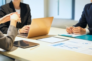M&A Advisor Handling Negotiation Between Parties in A Business Meeting