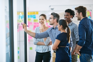 Team in Office Planning Creative Strategy for Running A Business