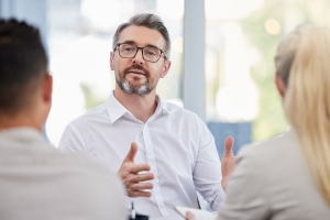 business owner discussing net working capital with their team