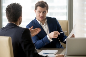 consultant reviewing expenses with client