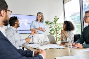 executive reviewing cash for with their team